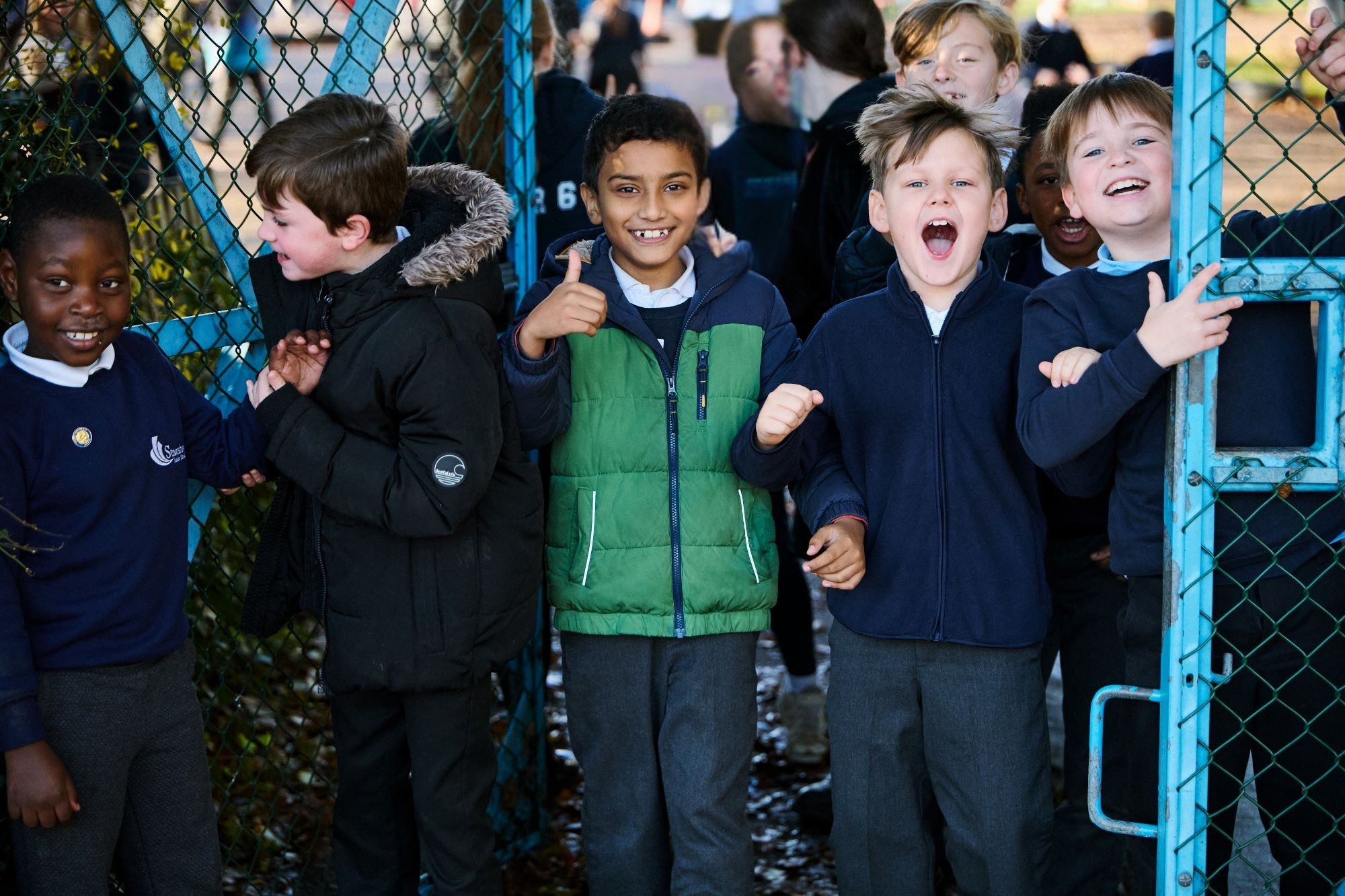 Happy children smiling in school playground