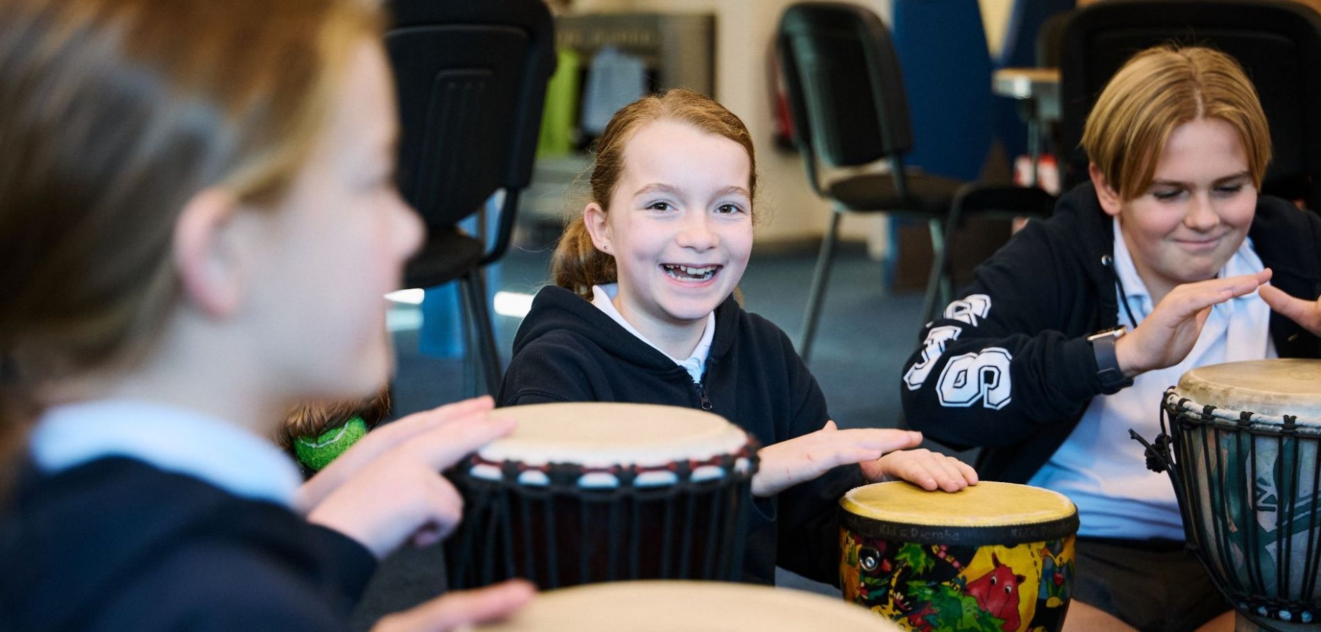 Children playing the drums